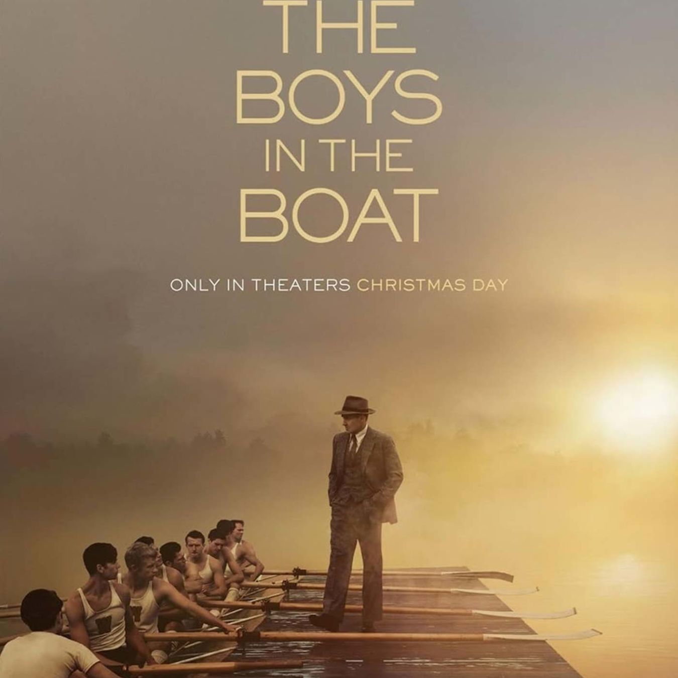 Film poster for The Boys in the Boat shows a rowing 8 in the water with their coach giving instruction from the side